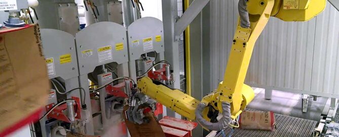 Robotic valve bag placer for cement and building products